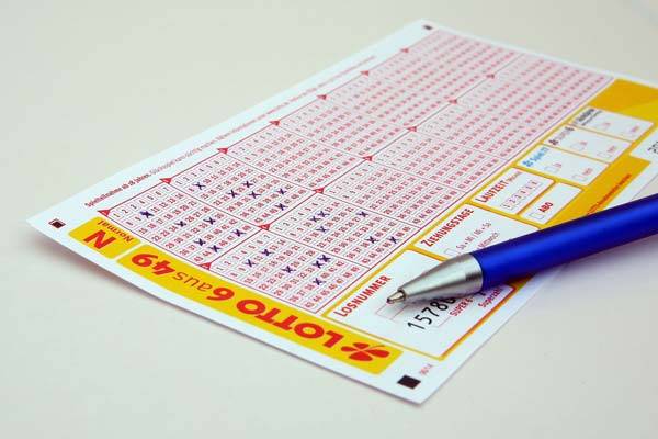 lottery ticket with pen